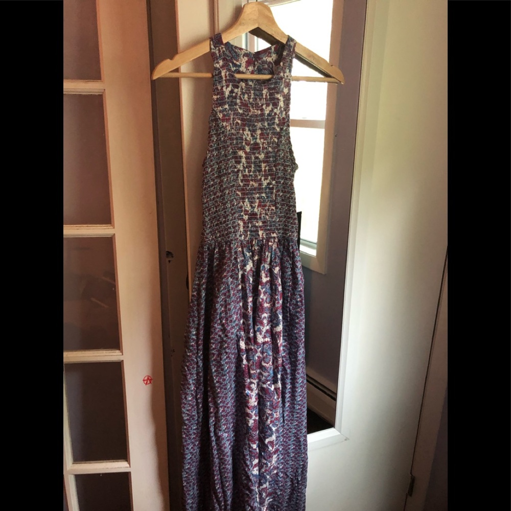 Brand new maxi dress. Semi open back